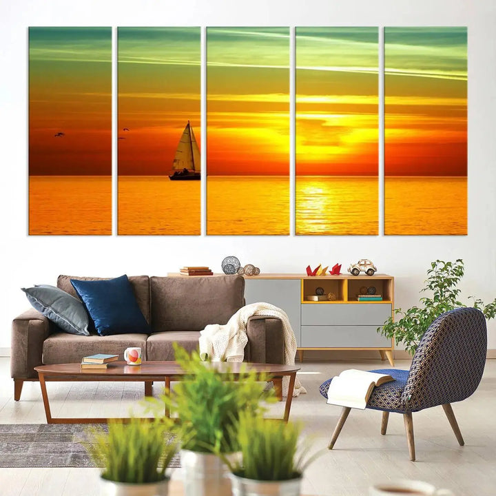 The "Wall Art Canvas Sailboat and Sailors at Sunset" is a triptych showcasing a vibrant sunset over the sea with a sailboat, elegantly displayed on gallery-wrapped, museum-quality canvas. The artworks feature a UV-protective coating to ensure their radiant colors are preserved for years to come.