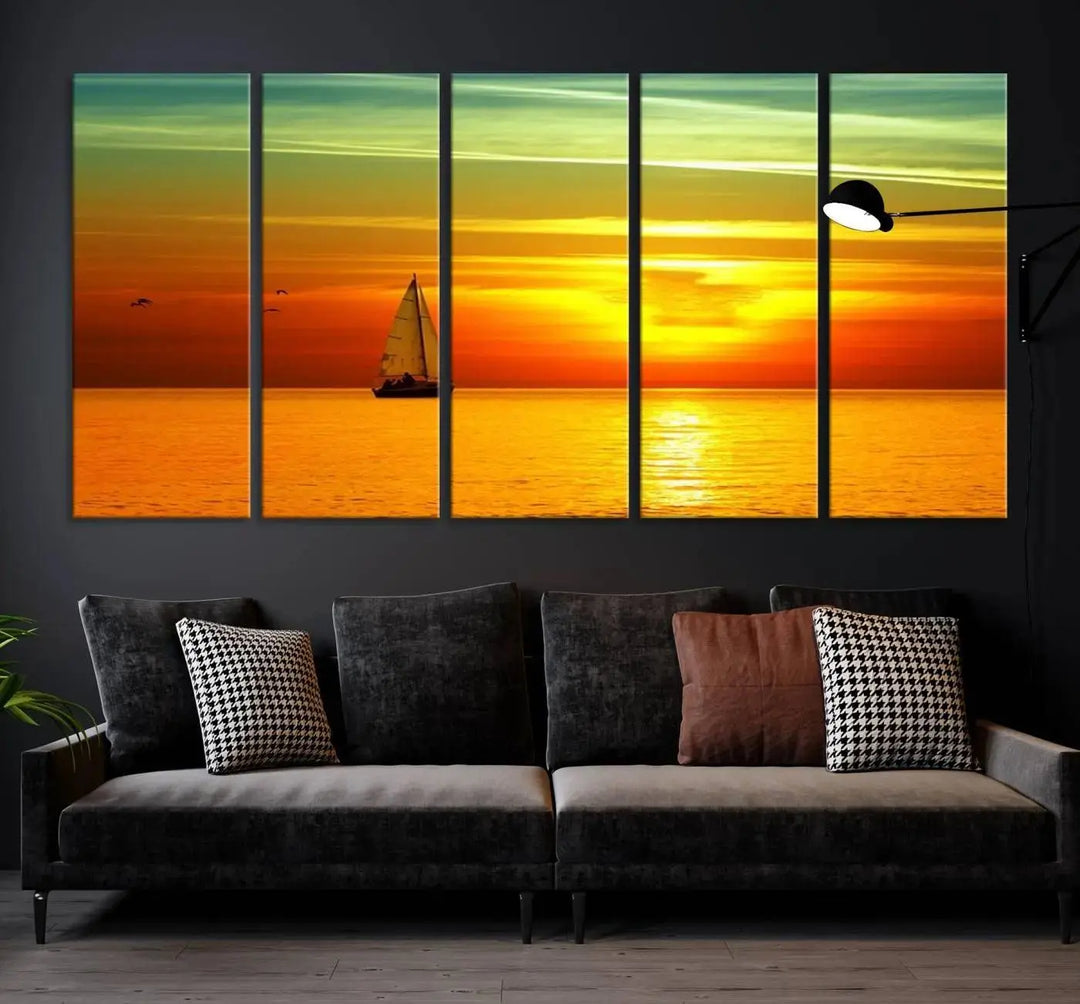 The "Wall Art Canvas Sailboat and Sailors at Sunset" is a triptych showcasing a vibrant sunset over the sea with a sailboat, elegantly displayed on gallery-wrapped, museum-quality canvas. The artworks feature a UV-protective coating to ensure their radiant colors are preserved for years to come.