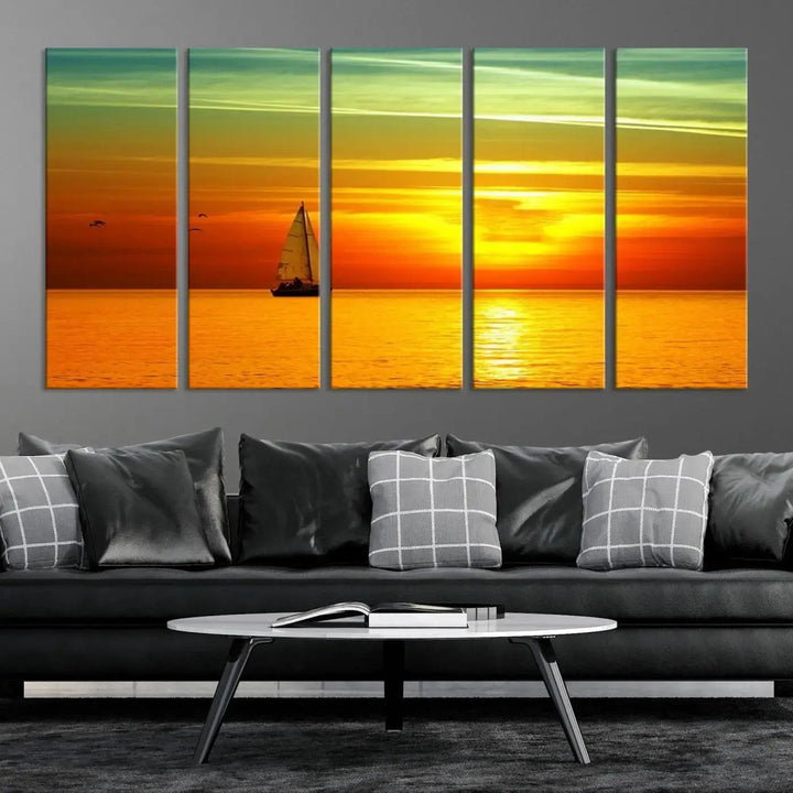 The "Wall Art Canvas Sailboat and Sailors at Sunset" is a triptych showcasing a vibrant sunset over the sea with a sailboat, elegantly displayed on gallery-wrapped, museum-quality canvas. The artworks feature a UV-protective coating to ensure their radiant colors are preserved for years to come.