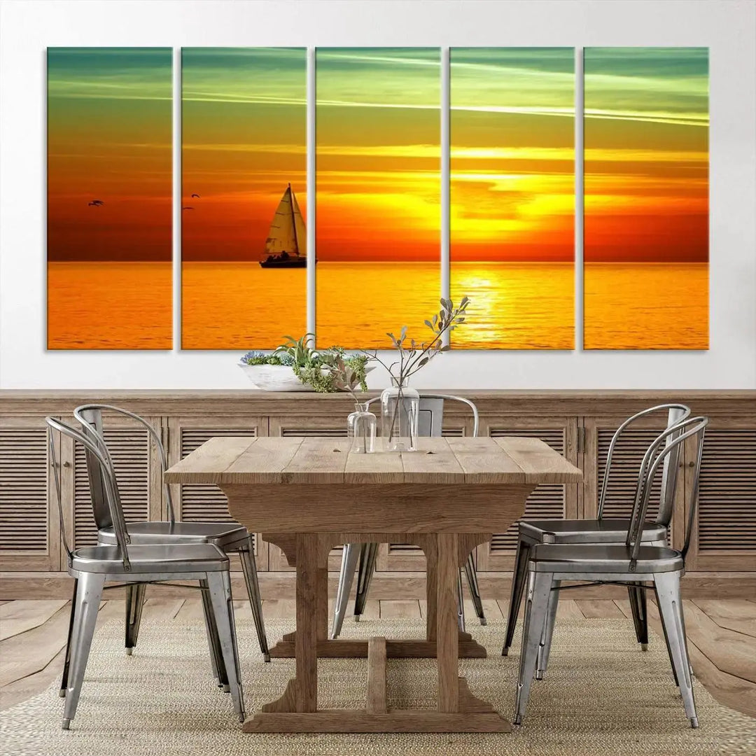 The "Wall Art Canvas Sailboat and Sailors at Sunset" is a triptych showcasing a vibrant sunset over the sea with a sailboat, elegantly displayed on gallery-wrapped, museum-quality canvas. The artworks feature a UV-protective coating to ensure their radiant colors are preserved for years to come.