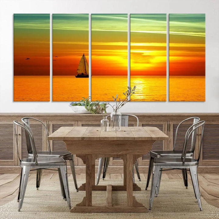 The "Wall Art Canvas Sailboat and Sailors at Sunset" is a triptych showcasing a vibrant sunset over the sea with a sailboat, elegantly displayed on gallery-wrapped, museum-quality canvas. The artworks feature a UV-protective coating to ensure their radiant colors are preserved for years to come.