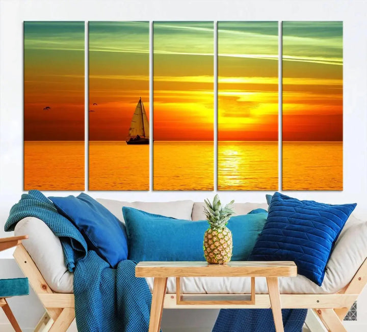 The "Wall Art Canvas Sailboat and Sailors at Sunset" is a triptych showcasing a vibrant sunset over the sea with a sailboat, elegantly displayed on gallery-wrapped, museum-quality canvas. The artworks feature a UV-protective coating to ensure their radiant colors are preserved for years to come.