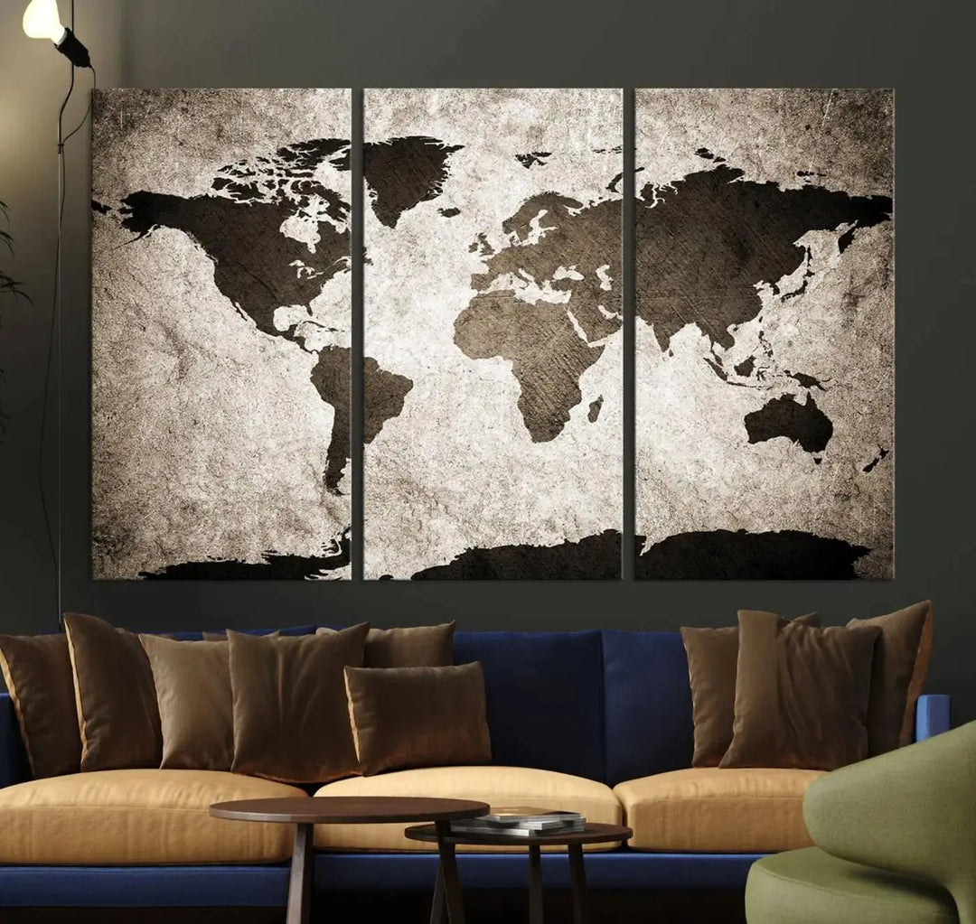 The living room features the "Wall Art Dark World Map on Light Background Canvas Print," a three-panel masterpiece crafted from museum-quality canvases with a UV-protective coating.