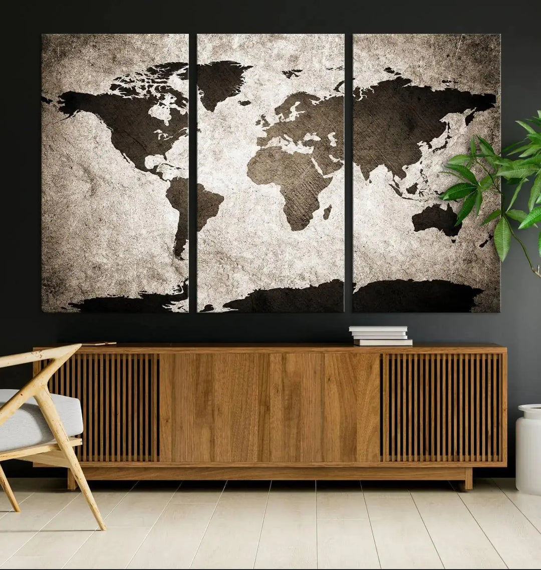 The living room features the "Wall Art Dark World Map on Light Background Canvas Print," a three-panel masterpiece crafted from museum-quality canvases with a UV-protective coating.