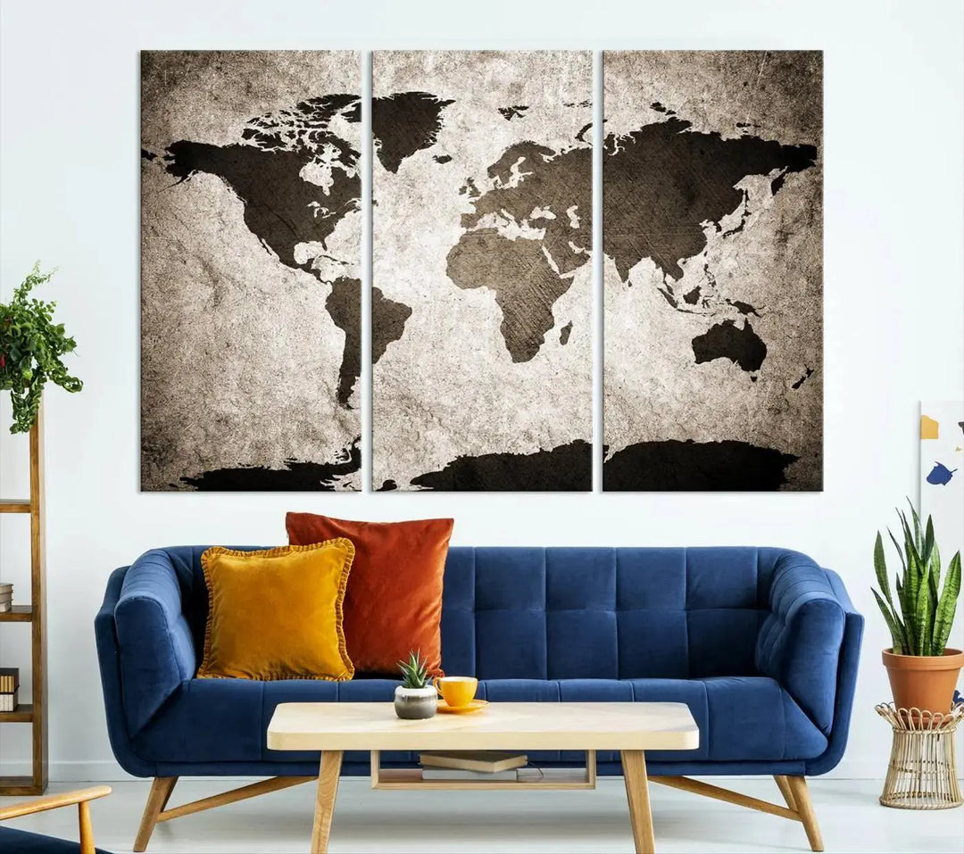 The living room features the "Wall Art Dark World Map on Light Background Canvas Print," a three-panel masterpiece crafted from museum-quality canvases with a UV-protective coating.