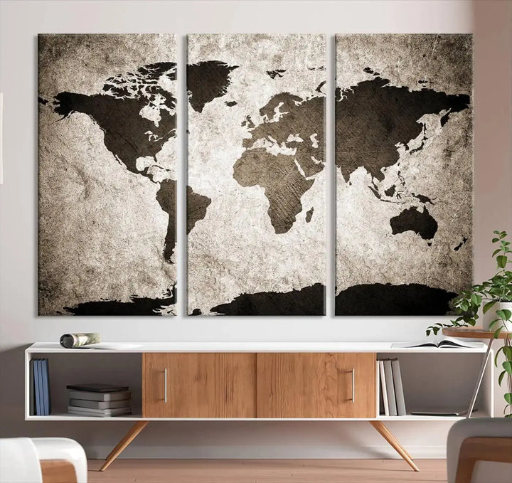 The living room features the "Wall Art Dark World Map on Light Background Canvas Print," a three-panel masterpiece crafted from museum-quality canvases with a UV-protective coating.