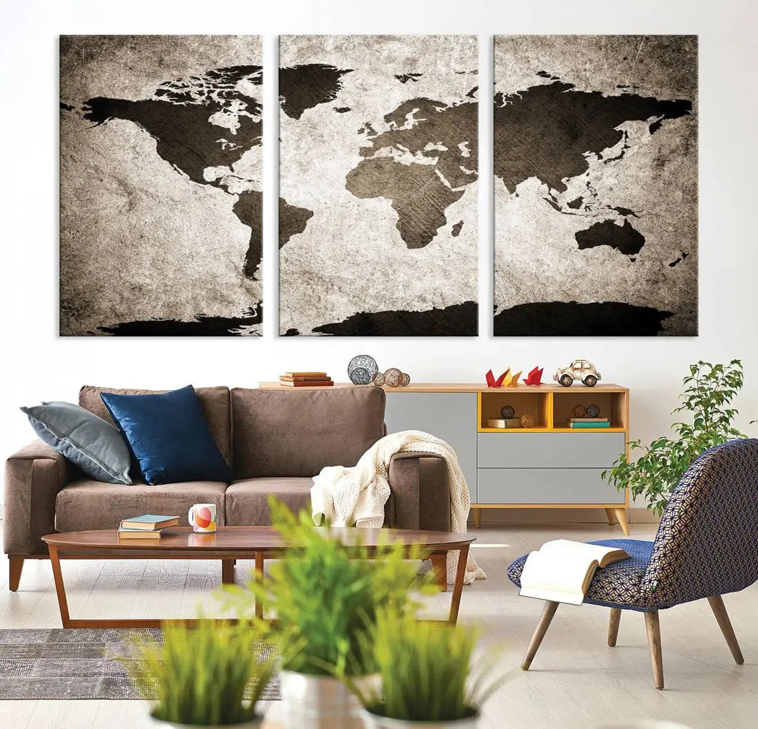 The living room features the "Wall Art Dark World Map on Light Background Canvas Print," a three-panel masterpiece crafted from museum-quality canvases with a UV-protective coating.