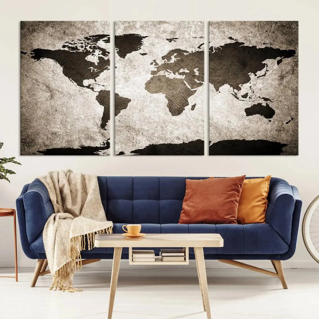 The living room features the "Wall Art Dark World Map on Light Background Canvas Print," a three-panel masterpiece crafted from museum-quality canvases with a UV-protective coating.