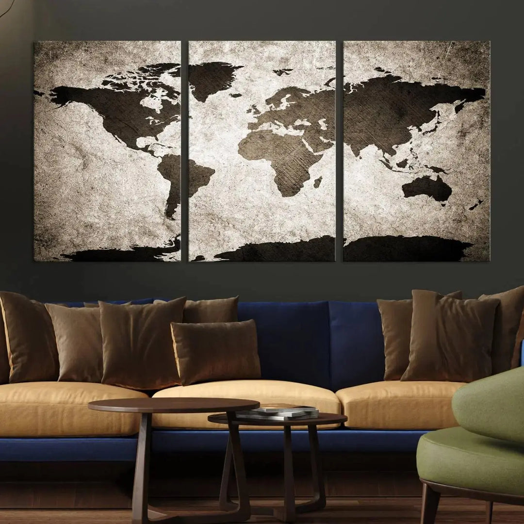 The living room features the "Wall Art Dark World Map on Light Background Canvas Print," a three-panel masterpiece crafted from museum-quality canvases with a UV-protective coating.