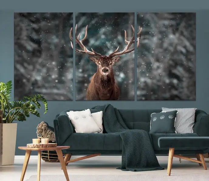 The Wall Art Deer Art Animal Canvas Print, a triptych piece featuring a deer in a snowy forest, is printed on museum-quality canvas with UV-protective coating and comes ready to hang.