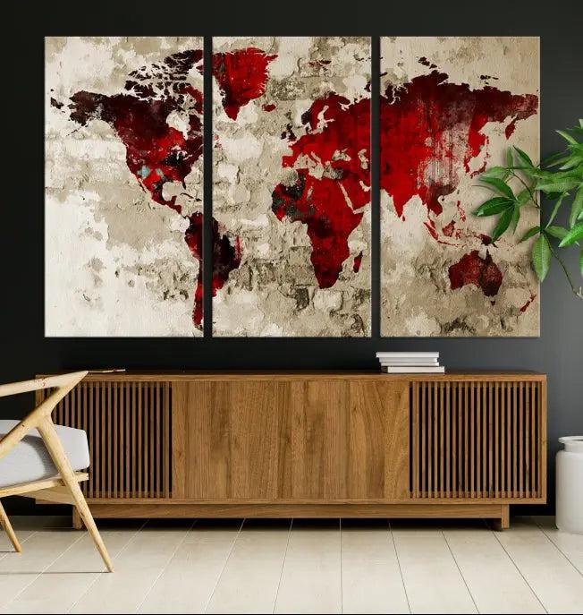 The Wall Art Grunge Red World Map Canvas Print features a three-panel design with red continents on a textured beige background and is elegantly gallery wrapped.