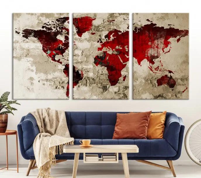 The Wall Art Grunge Red World Map Canvas Print features a three-panel design with red continents on a textured beige background and is elegantly gallery wrapped.