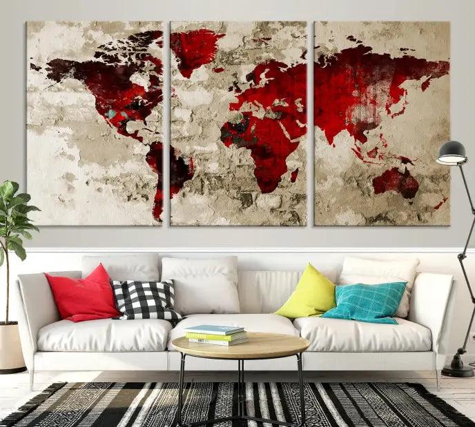 The Wall Art Grunge Red World Map Canvas Print features a three-panel design with red continents on a textured beige background and is elegantly gallery wrapped.