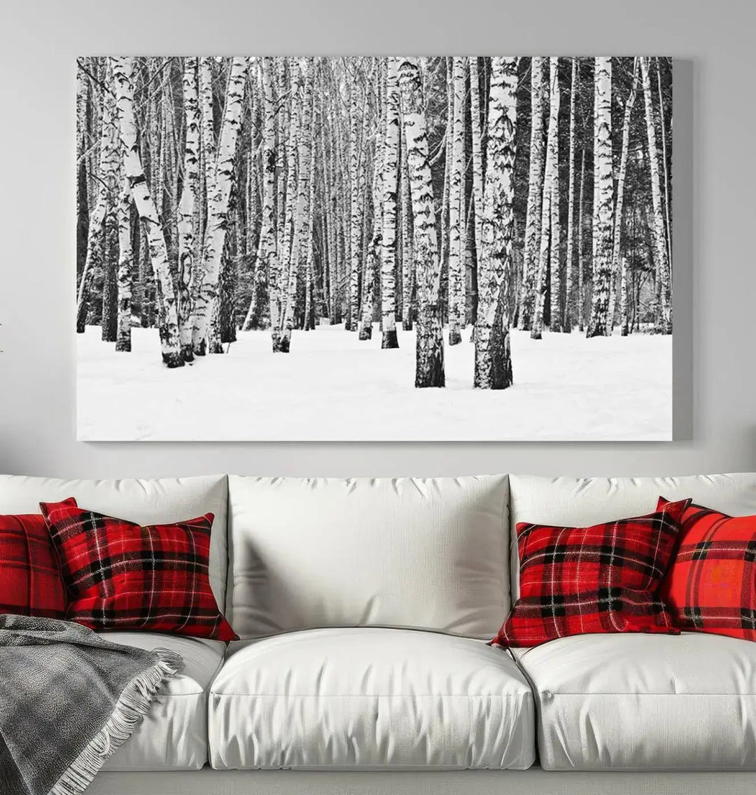 A canvas print titled "Wall Art Landscape Canvas Print Forest in Winter with Snowy Ground and Trees" is displayed, enhancing the modern living room's decor.