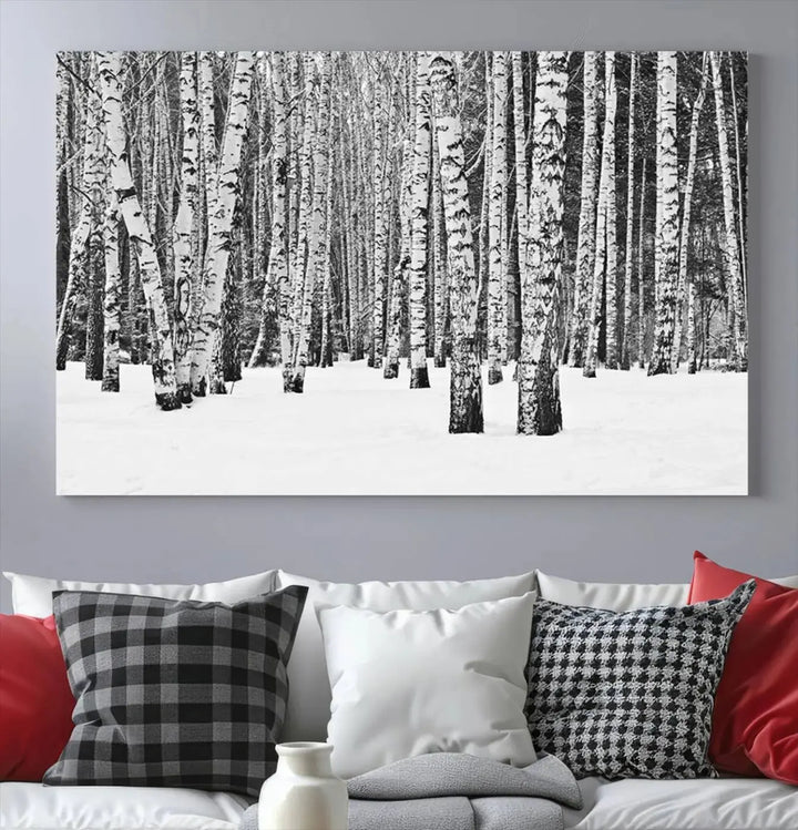 A canvas print titled "Wall Art Landscape Canvas Print Forest in Winter with Snowy Ground and Trees" is displayed, enhancing the modern living room's decor.