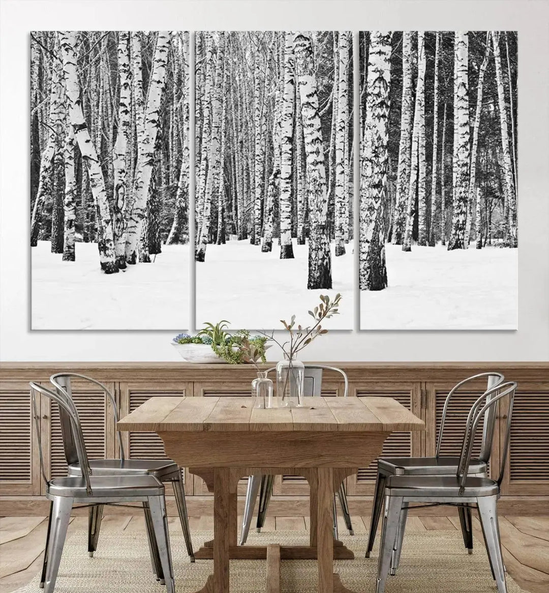 A canvas print titled "Wall Art Landscape Canvas Print Forest in Winter with Snowy Ground and Trees" is displayed, enhancing the modern living room's decor.