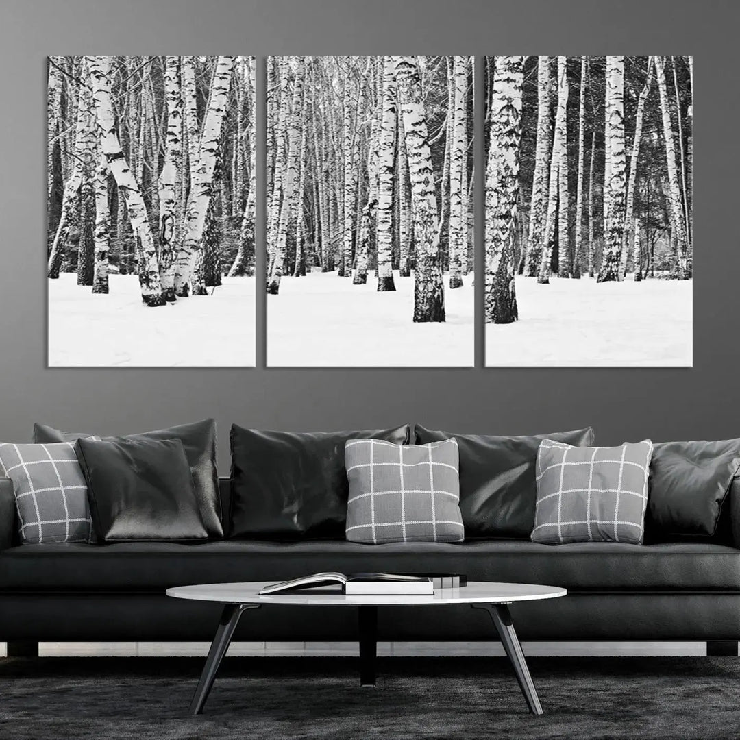 A canvas print titled "Wall Art Landscape Canvas Print Forest in Winter with Snowy Ground and Trees" is displayed, enhancing the modern living room's decor.