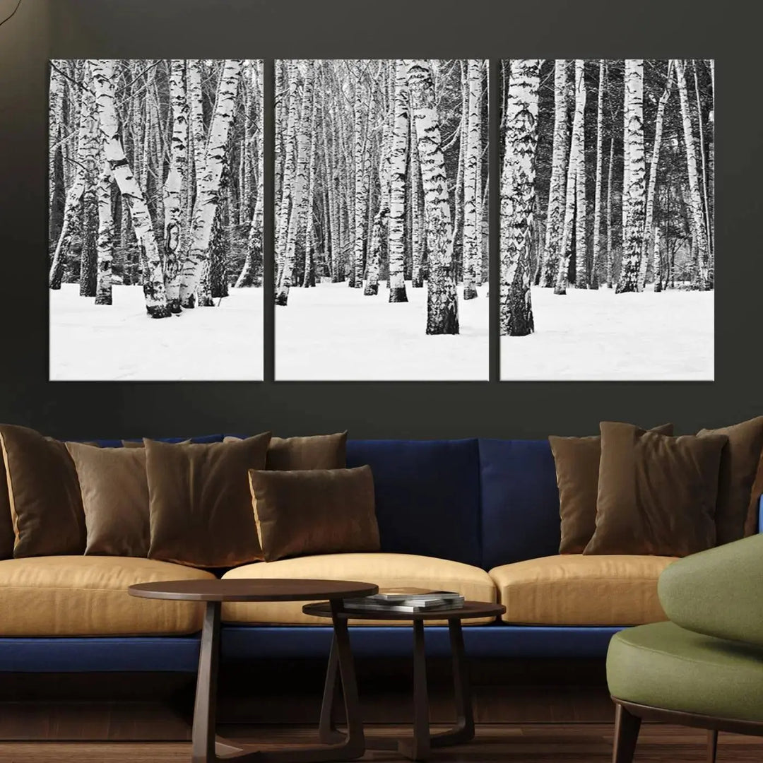 A canvas print titled "Wall Art Landscape Canvas Print Forest in Winter with Snowy Ground and Trees" is displayed, enhancing the modern living room's decor.