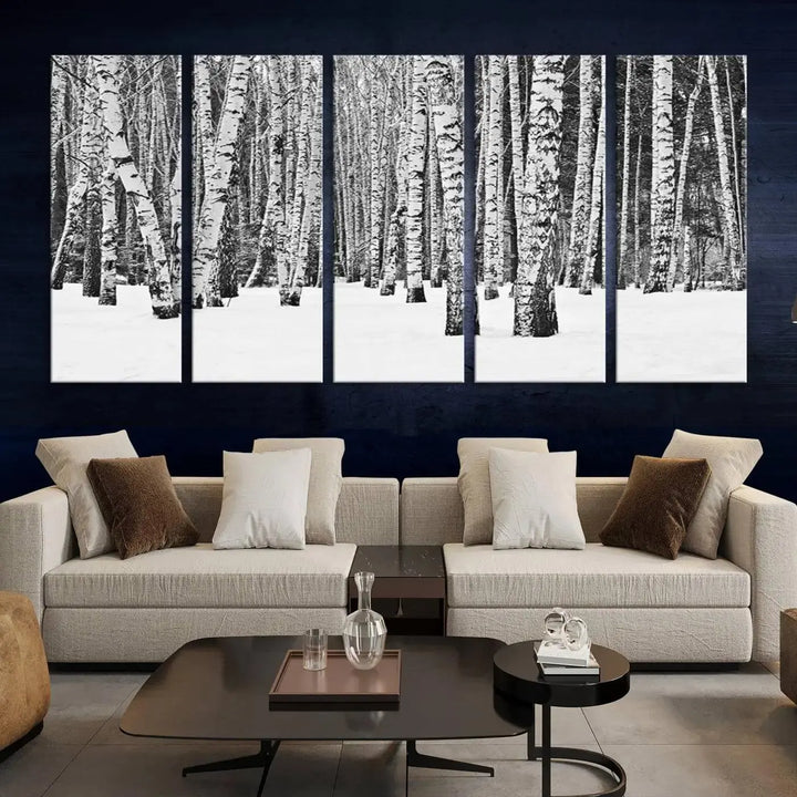 A canvas print titled "Wall Art Landscape Canvas Print Forest in Winter with Snowy Ground and Trees" is displayed, enhancing the modern living room's decor.