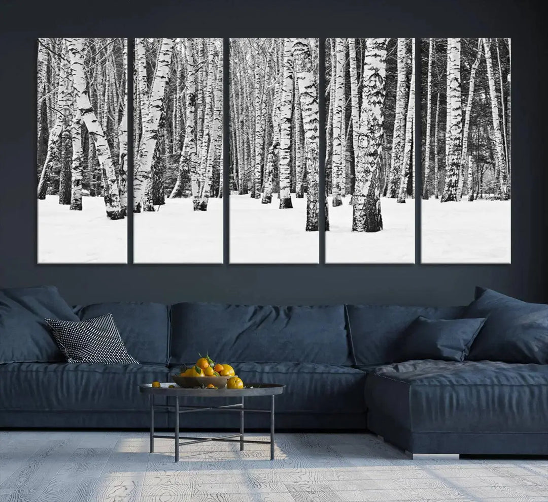 A canvas print titled "Wall Art Landscape Canvas Print Forest in Winter with Snowy Ground and Trees" is displayed, enhancing the modern living room's decor.