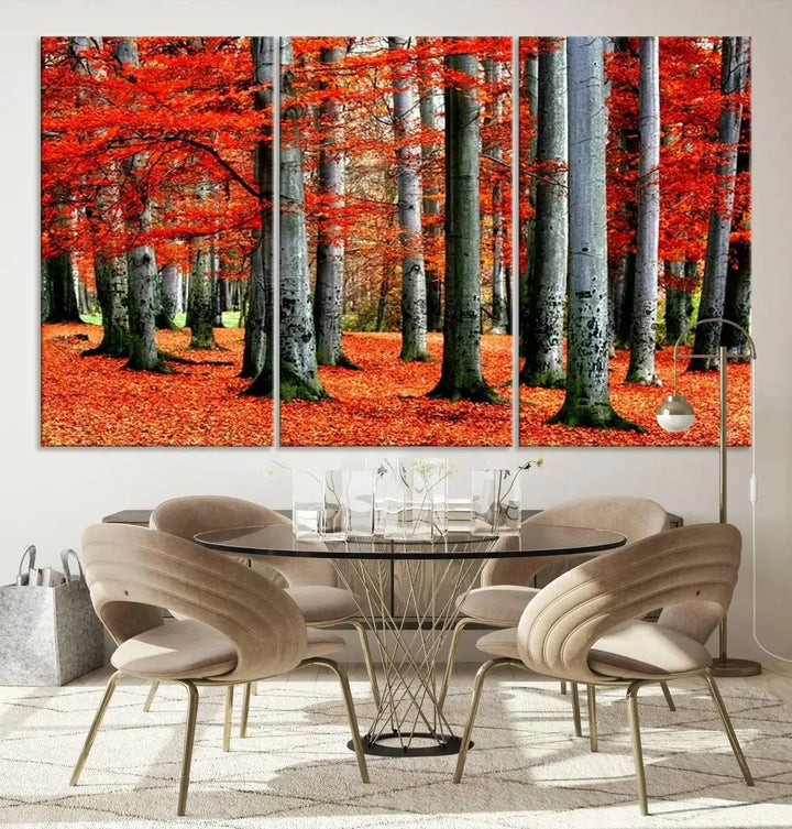 A large wall art titled "Red Leaves on Trees on Red Ground" is printed on museum-quality canvas, featuring a vibrant autumn forest scene. It comes with a UV-protective coating and is ready to hang.