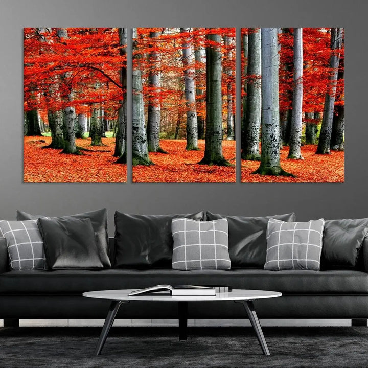 A large wall art titled "Red Leaves on Trees on Red Ground" is printed on museum-quality canvas, featuring a vibrant autumn forest scene. It comes with a UV-protective coating and is ready to hang.