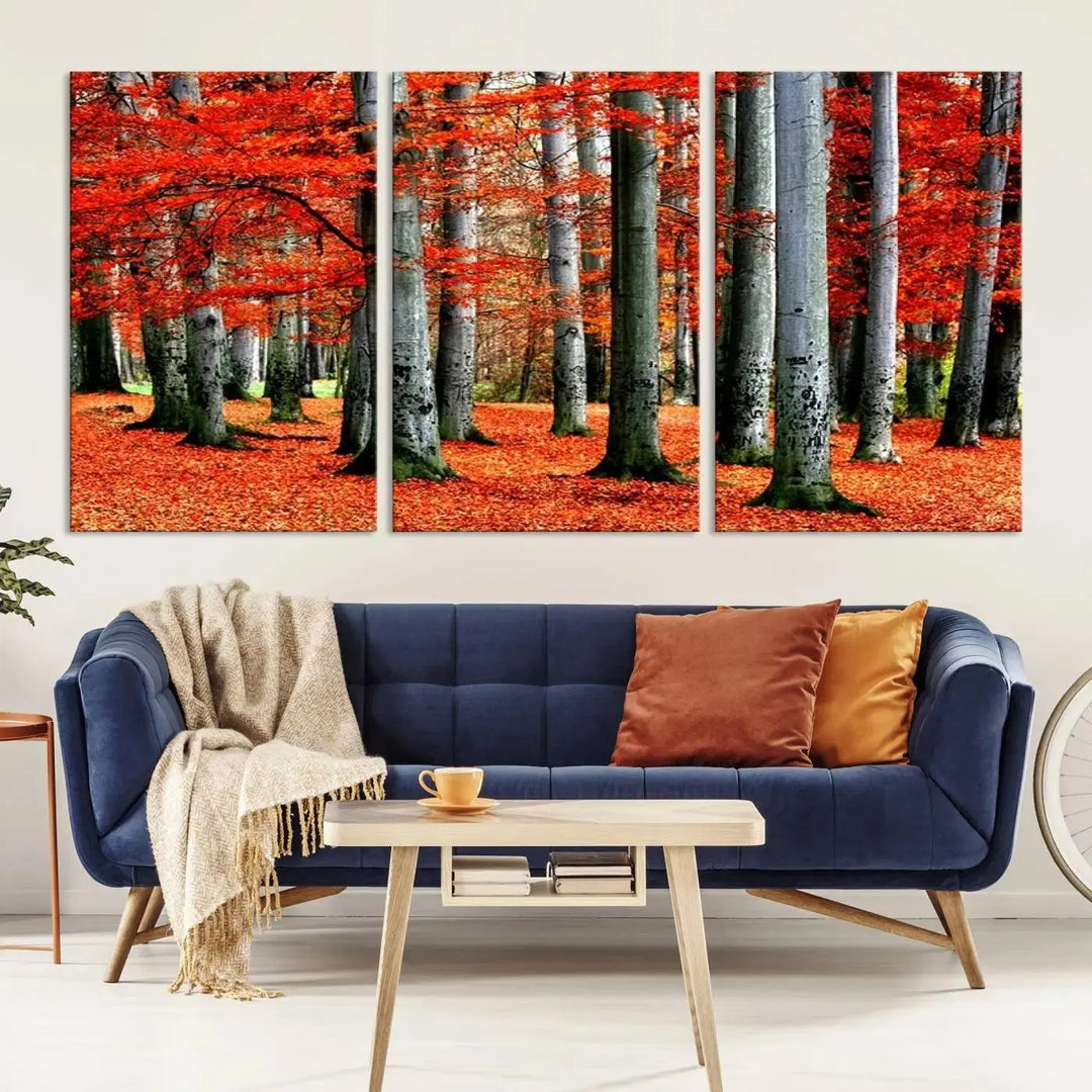 A large wall art titled "Red Leaves on Trees on Red Ground" is printed on museum-quality canvas, featuring a vibrant autumn forest scene. It comes with a UV-protective coating and is ready to hang.