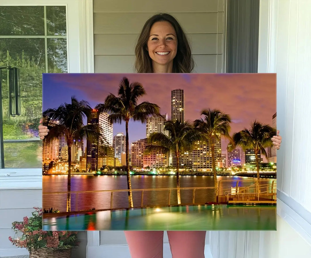 MIAMI Canvas Print: A vibrant depiction of the Miami skyline with illuminated skyscrapers, palms, and a reflecting pool at dusk.