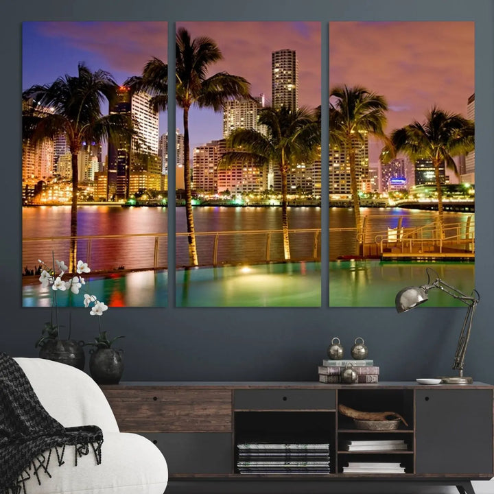 MIAMI Canvas Print: A vibrant depiction of the Miami skyline with illuminated skyscrapers, palms, and a reflecting pool at dusk.