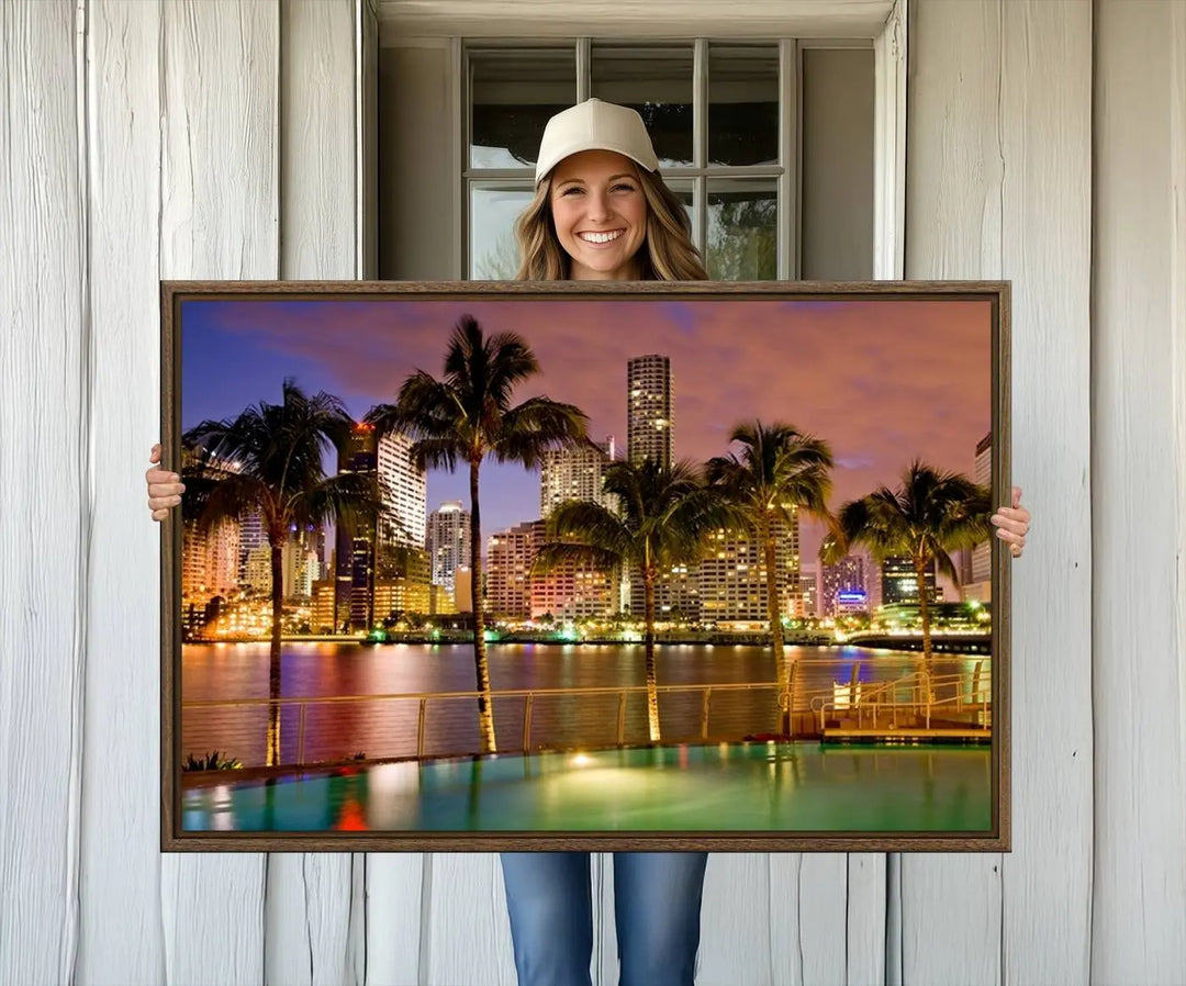 MIAMI Canvas Print: A vibrant depiction of the Miami skyline with illuminated skyscrapers, palms, and a reflecting pool at dusk.