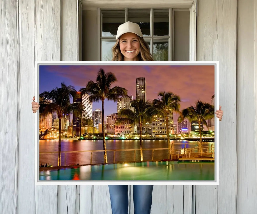 MIAMI Canvas Print: A vibrant depiction of the Miami skyline with illuminated skyscrapers, palms, and a reflecting pool at dusk.