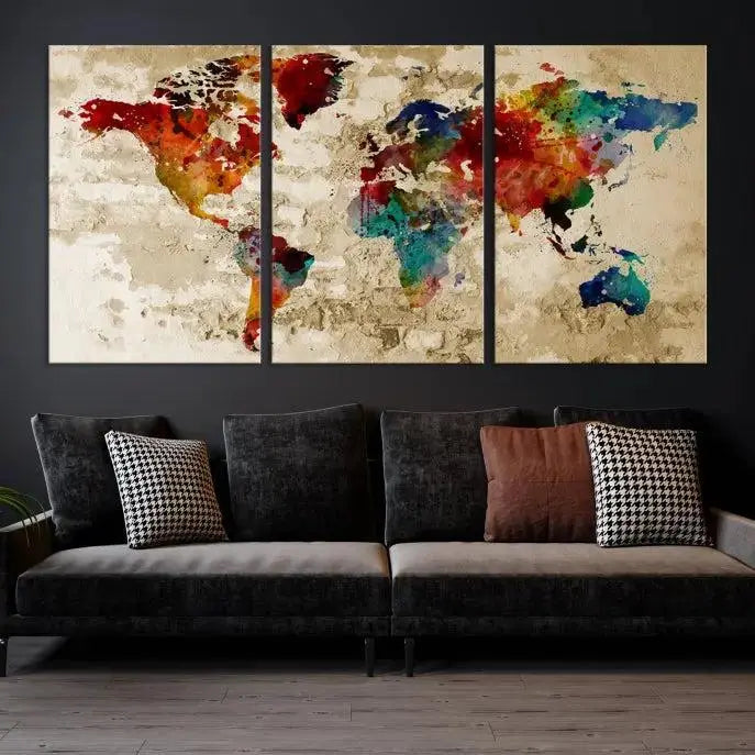 The "Wall Art Old Wall Background Watercolor Map Canvas Print" is a triptych featuring a colorful world map on museum-quality canvas and has a UV-protective coating.