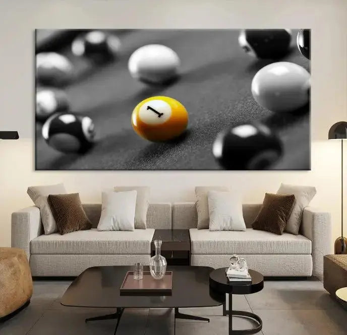 The Wall Art Pool Table and Balls Canvas Print features a triptych design with vibrant billiard balls, highlighting the yellow number 1 ball. This captivating piece is handmade in the USA on museum-quality canvas, offering an exquisite enhancement to your space. It comes with free shipping for your convenience.