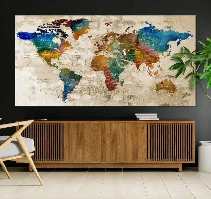 The living room features a Wall Art Printing World Map Push Pin Prints On Canvas triptych, contributing stylish elegance to any home.