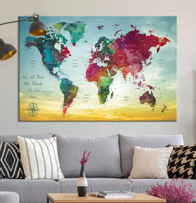 The "Wall Art Push Pin Personalized World Map Canvas Print" is a stunning three-panel piece crafted on museum-quality canvas with vibrant colors. It features a quote on the left panel, and all panels are gallery wrapped for an elegant finish. A UV-protective coating preserves their beauty.