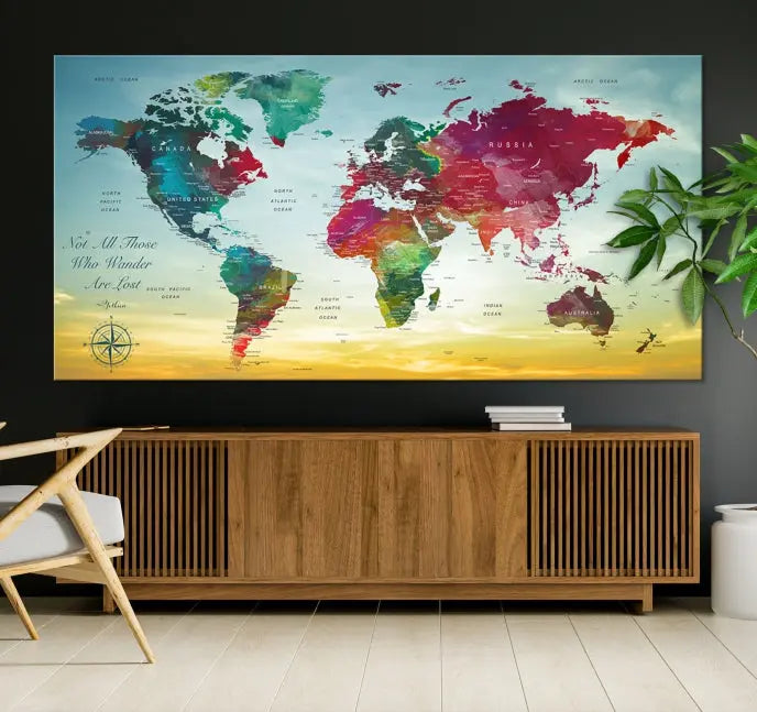 The "Wall Art Push Pin Personalized World Map Canvas Print" is a stunning three-panel piece crafted on museum-quality canvas with vibrant colors. It features a quote on the left panel, and all panels are gallery wrapped for an elegant finish. A UV-protective coating preserves their beauty.