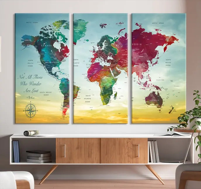 The "Wall Art Push Pin Personalized World Map Canvas Print" is a stunning three-panel piece crafted on museum-quality canvas with vibrant colors. It features a quote on the left panel, and all panels are gallery wrapped for an elegant finish. A UV-protective coating preserves their beauty.