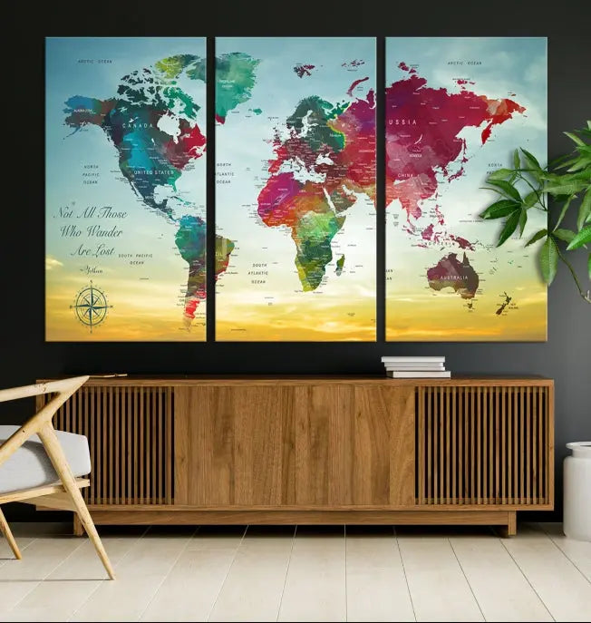 The "Wall Art Push Pin Personalized World Map Canvas Print" is a stunning three-panel piece crafted on museum-quality canvas with vibrant colors. It features a quote on the left panel, and all panels are gallery wrapped for an elegant finish. A UV-protective coating preserves their beauty.