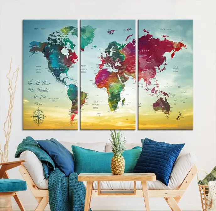 The "Wall Art Push Pin Personalized World Map Canvas Print" is a stunning three-panel piece crafted on museum-quality canvas with vibrant colors. It features a quote on the left panel, and all panels are gallery wrapped for an elegant finish. A UV-protective coating preserves their beauty.