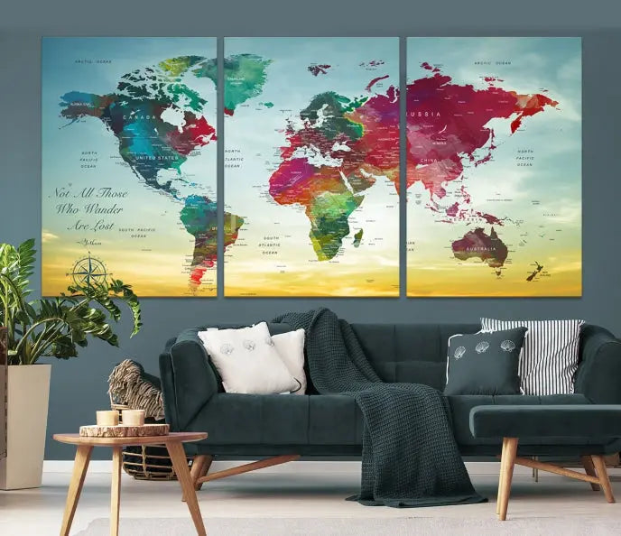 The "Wall Art Push Pin Personalized World Map Canvas Print" is a stunning three-panel piece crafted on museum-quality canvas with vibrant colors. It features a quote on the left panel, and all panels are gallery wrapped for an elegant finish. A UV-protective coating preserves their beauty.