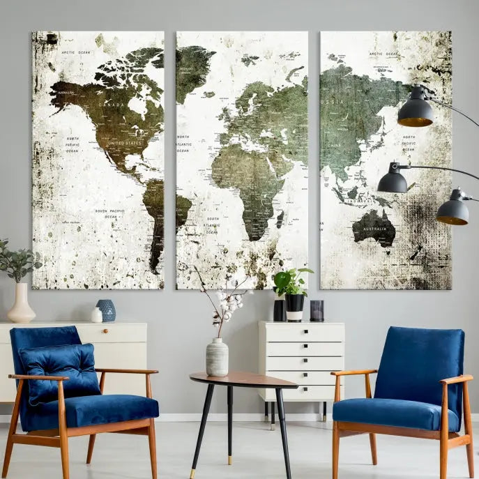 A Wall Art Push Pin World Map Canvas Print is displayed, showcasing an abstract world map in earthy tones. This museum-quality canvas is ready to hang and includes a UV-protective coating to maintain its vibrant shades.