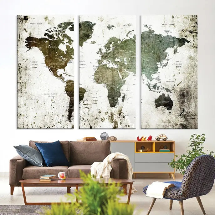 A Wall Art Push Pin World Map Canvas Print is displayed, showcasing an abstract world map in earthy tones. This museum-quality canvas is ready to hang and includes a UV-protective coating to maintain its vibrant shades.