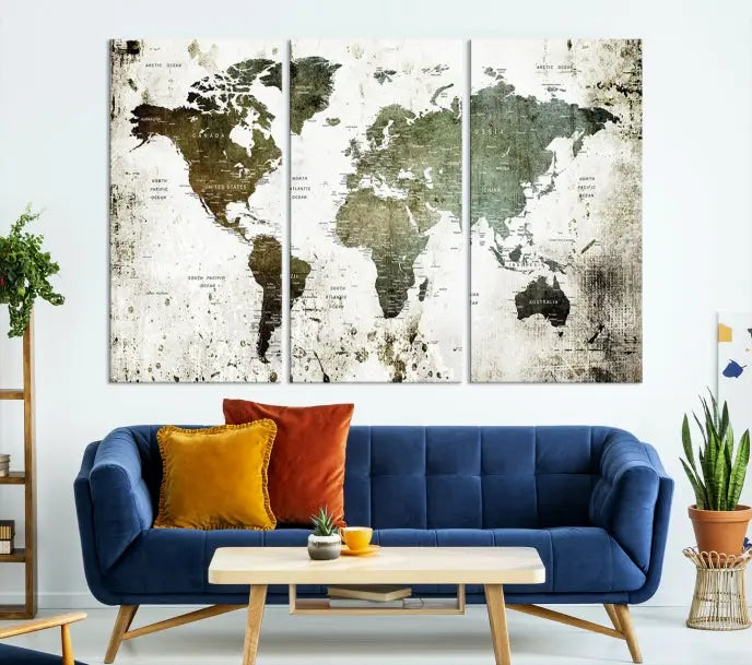 A Wall Art Push Pin World Map Canvas Print is displayed, showcasing an abstract world map in earthy tones. This museum-quality canvas is ready to hang and includes a UV-protective coating to maintain its vibrant shades.