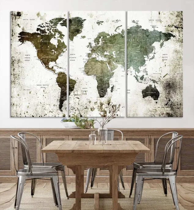 A Wall Art Push Pin World Map Canvas Print is displayed, showcasing an abstract world map in earthy tones. This museum-quality canvas is ready to hang and includes a UV-protective coating to maintain its vibrant shades.