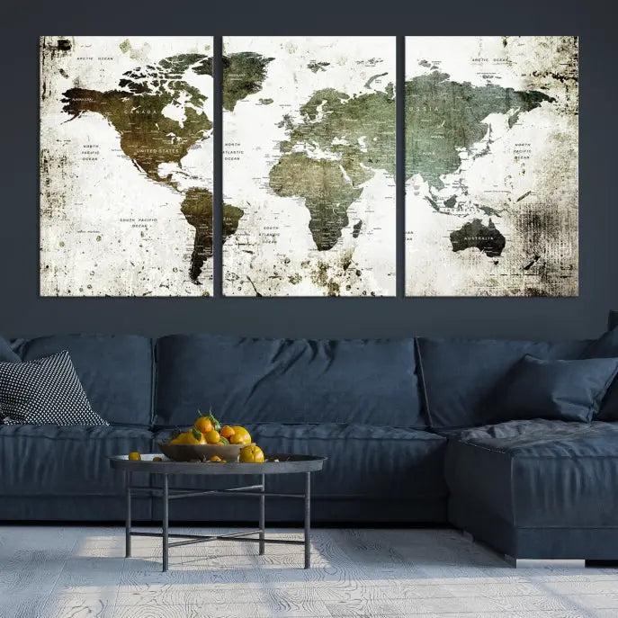 A Wall Art Push Pin World Map Canvas Print is displayed, showcasing an abstract world map in earthy tones. This museum-quality canvas is ready to hang and includes a UV-protective coating to maintain its vibrant shades.