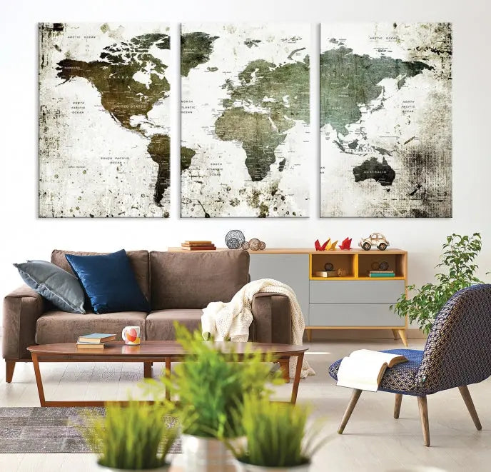 A Wall Art Push Pin World Map Canvas Print is displayed, showcasing an abstract world map in earthy tones. This museum-quality canvas is ready to hang and includes a UV-protective coating to maintain its vibrant shades.