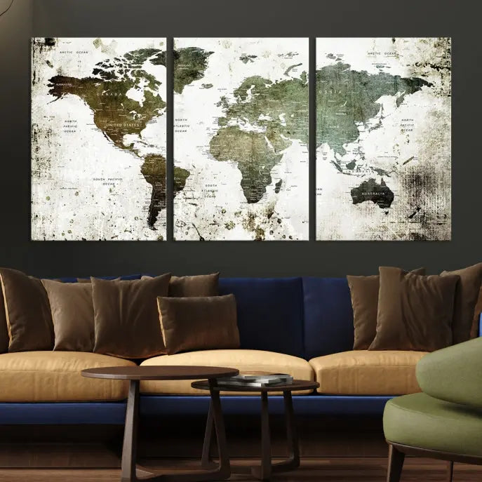 A Wall Art Push Pin World Map Canvas Print is displayed, showcasing an abstract world map in earthy tones. This museum-quality canvas is ready to hang and includes a UV-protective coating to maintain its vibrant shades.