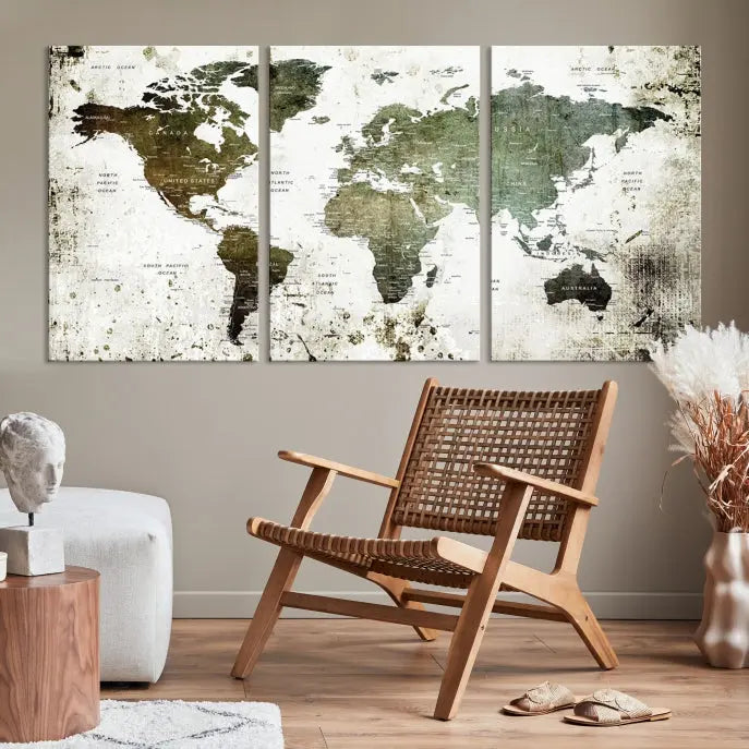 A Wall Art Push Pin World Map Canvas Print is displayed, showcasing an abstract world map in earthy tones. This museum-quality canvas is ready to hang and includes a UV-protective coating to maintain its vibrant shades.