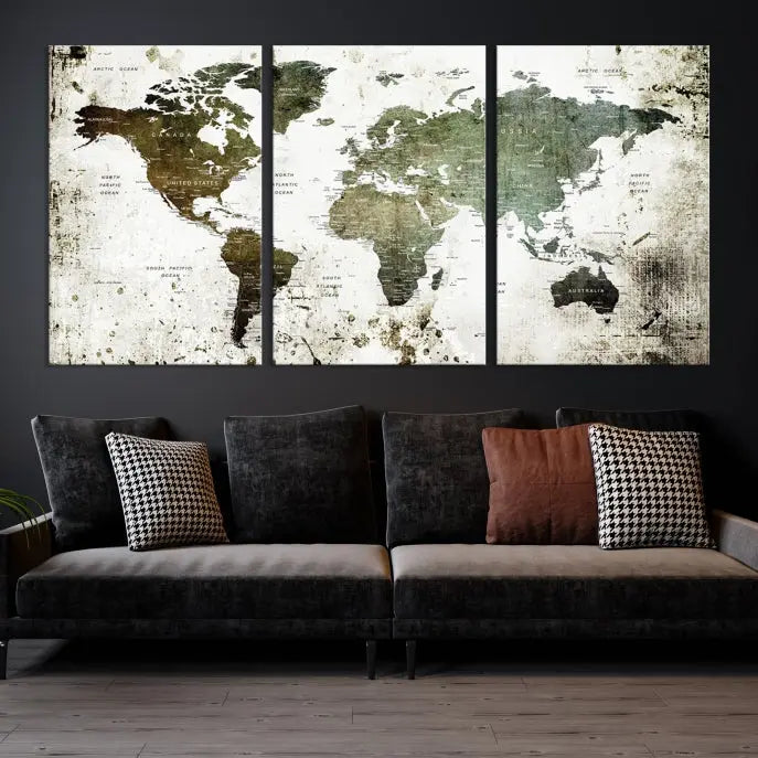 A Wall Art Push Pin World Map Canvas Print is displayed, showcasing an abstract world map in earthy tones. This museum-quality canvas is ready to hang and includes a UV-protective coating to maintain its vibrant shades.