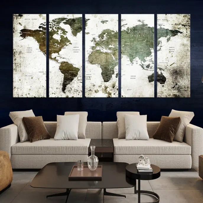 A Wall Art Push Pin World Map Canvas Print is displayed, showcasing an abstract world map in earthy tones. This museum-quality canvas is ready to hang and includes a UV-protective coating to maintain its vibrant shades.